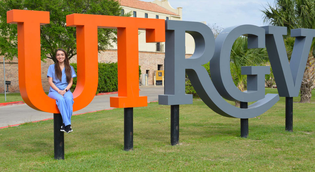 UTRGV Sign with student
