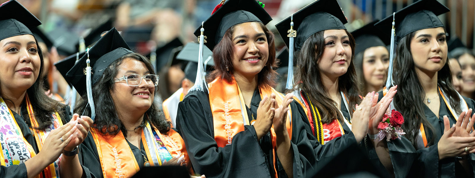 UTRGV CEP students stand and clap at commencement