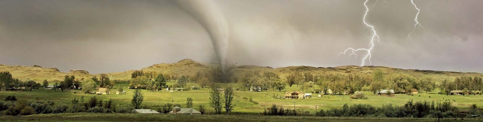 landscape view of tornado and lightning strike  Page Banner 