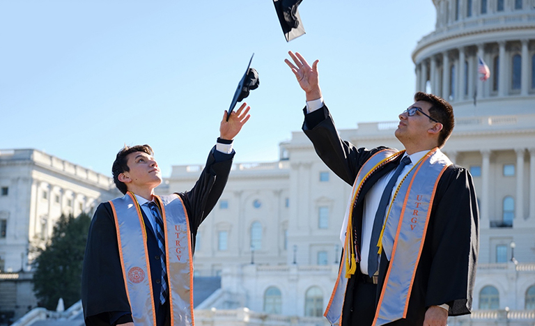 Matthew Rodriguez (left) and Anthony Hernandez (right) celebrating in their cap and gowns in Washington D.C. as both UTRGV students get ready to graduate Saturday, May 11. Both took part in the Archer Fellowship Program. (Courtesy Photo)