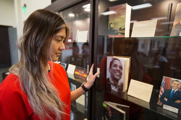 Student looks at Black History Month display.