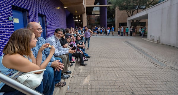 UTRGV H-E-B Planetarium attendees sitting in line for a chance to view the show.