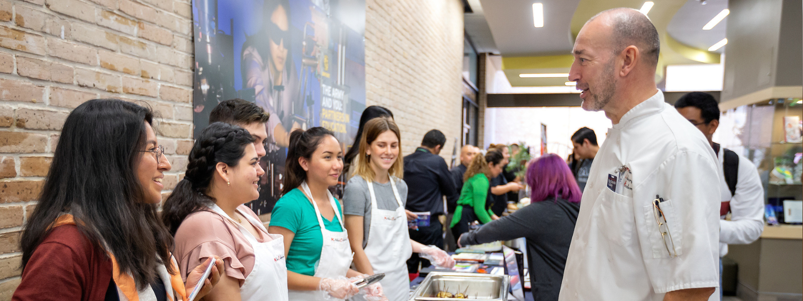 Chef Marcel Fortuin, lecturer in the UTRGV Hospitality and Tourism Management Program, speaks to his students during an event promoting the program on Thursday, Apr. 18, 2019 at the University Library in Edinburg, Texas. 