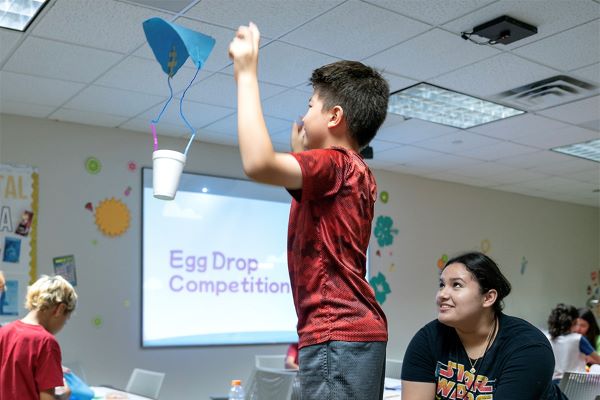 UTRGV summer camps offer a variety of STEM, art and fitness programs designed to ignite creativity, nurture passions and build community. These camps will continue through July for elementary, middle and high school students. Pictured are campers at last year's STEM Summer Camp taking part in the Egg Drop Challenge. (UTRGV Archival Photo by Paul Chouy)